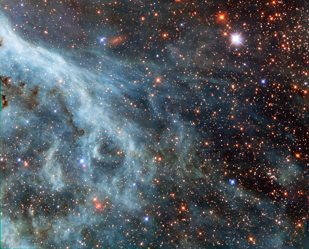 大麥哲倫雲中的藍綠色羽狀物  天文探討